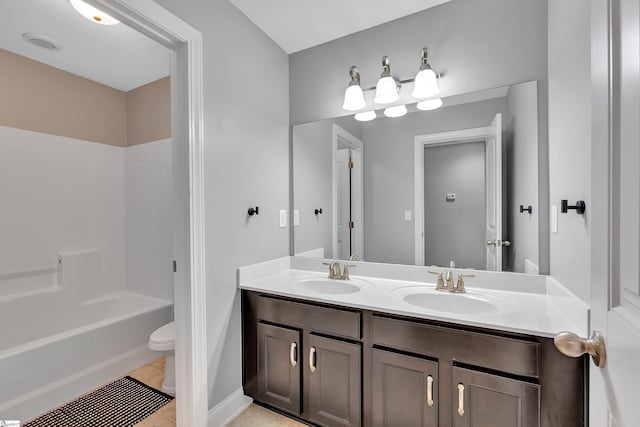 201 Wiscasset Way, Greenville, SC 29615 - bathroom with double vanity, tile patterned floors, toilet, and bathtub / shower combination