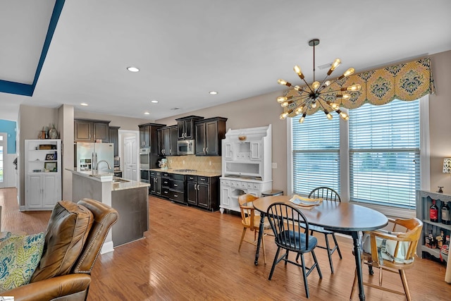 201 Wiscasset Way, Greenville, SC 29615 - dining room with a chandelier, light wood-style flooring, and recessed lighting