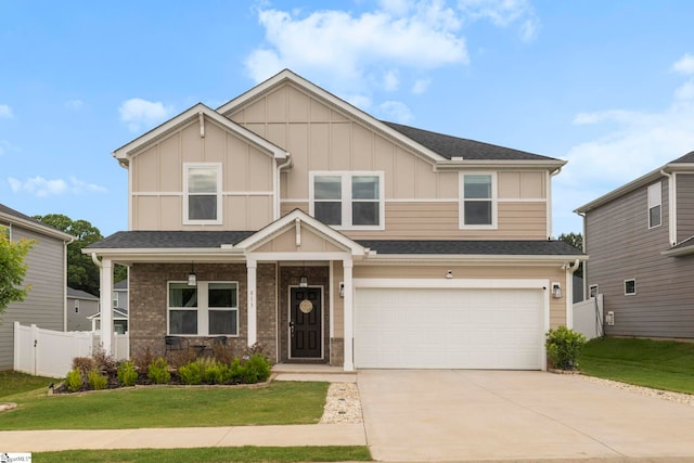 813 Elgon Walk Dr, Fountain Inn, SC 29644 - view of front of property with board and batten siding, driveway, an attached garage, and covered porch