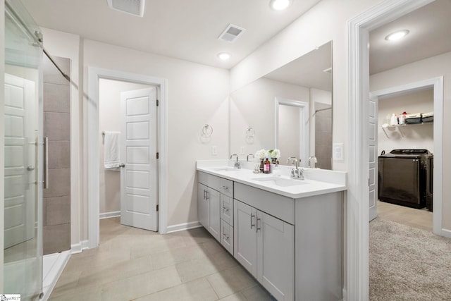 813 Elgon Walk Dr, Fountain Inn, SC 29644 - full bathroom featuring double vanity, a spacious closet, a stall shower, baseboards, and recessed lighting