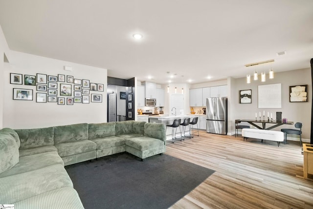 813 Elgon Walk Dr, Fountain Inn, SC 29644 - living area with light wood finished floors and recessed lighting