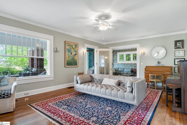 227 S Main St, Anderson, SC 29654 - living area with ceiling fan, ornamental molding, wood finished floors, and baseboards