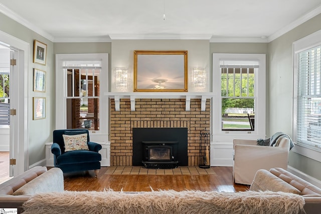 227 S Main St, Anderson, SC 29654 - living area featuring wood finished floors, crown molding, and baseboards