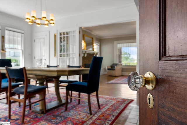 227 S Main St, Anderson, SC 29654 - dining area featuring a chandelier and crown molding