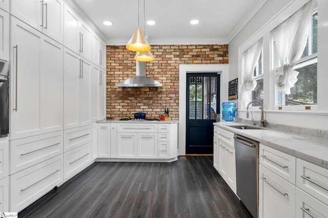 227 S Main St, Anderson, SC 29654 - kitchen with dishwasher, a sink, wall chimney range hood, white cabinetry, and ornamental molding