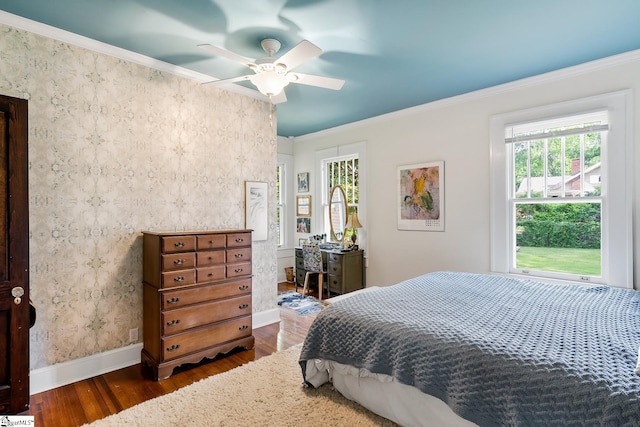 227 S Main St, Anderson, SC 29654 - bedroom with dark wood-style floors, ornamental molding, baseboards, and ceiling fan