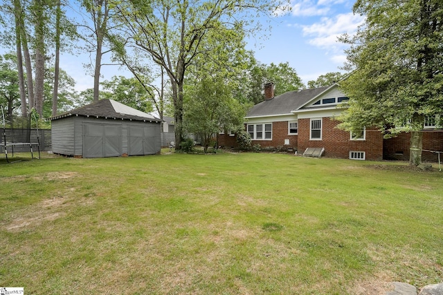 227 S Main St, Anderson, SC 29654 - view of yard featuring an outbuilding and a detached garage