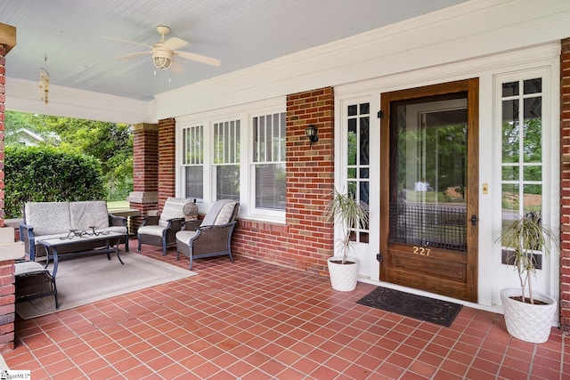227 S Main St, Anderson, SC 29654 - covered porch featuring ceiling fan and an outdoor living space