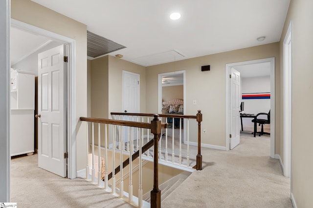 207 White Water Ct, Greer, SC 29650 - hall with attic access, an upstairs landing, carpet, and baseboards