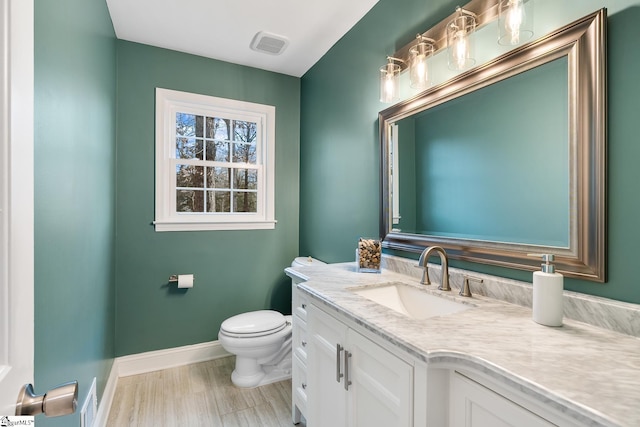 207 White Water Ct, Greer, SC 29650 - half bathroom featuring baseboards, toilet, and vanity