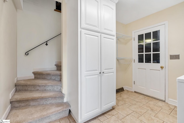 207 White Water Ct, Greer, SC 29650 - stairway featuring baseboards