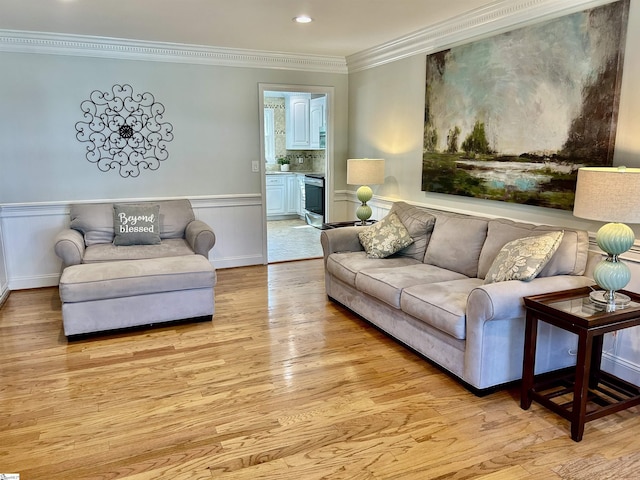 207 White Water Ct, Greer, SC 29650 - living area with light wood finished floors, crown molding, wainscoting, and recessed lighting