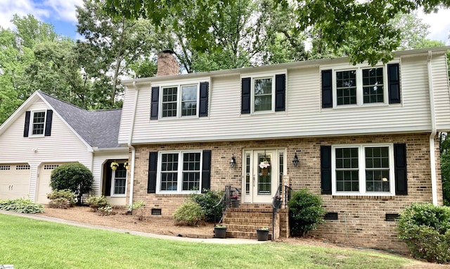 207 White Water Ct, Greer, SC 29650 - colonial-style house featuring brick siding, a chimney, crawl space, and a front yard