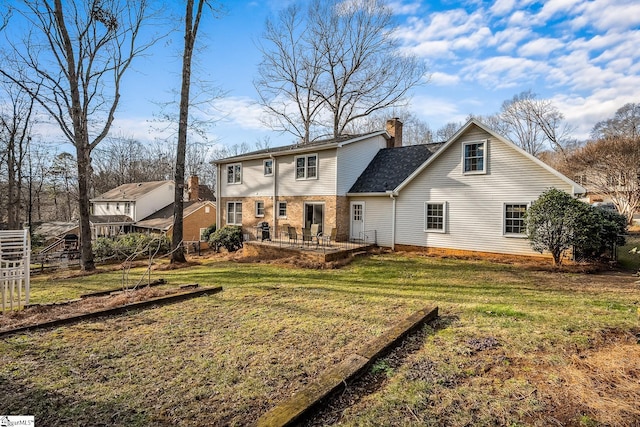 207 White Water Ct, Greer, SC 29650 - rear view of house featuring a chimney, a patio, and brick siding