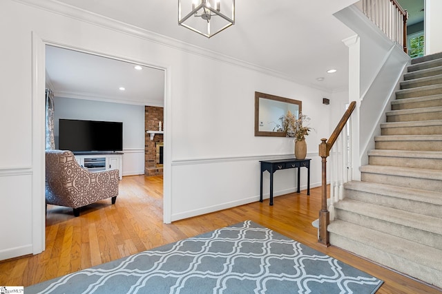 207 White Water Ct, Greer, SC 29650 - foyer featuring stairway, crown molding, hardwood / wood-style flooring, recessed lighting, and a chandelier