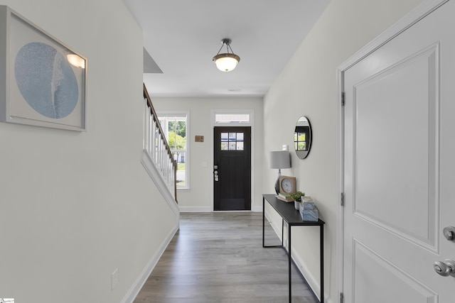 115 River Trace Loop, Simpsonville, SC 29680 - foyer entrance featuring light wood-style floors, stairway, and baseboards