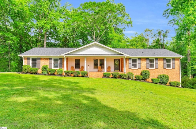 116 Arnold Dr, Anderson, SC 29621 - ranch-style house with a porch, brick siding, and a front lawn