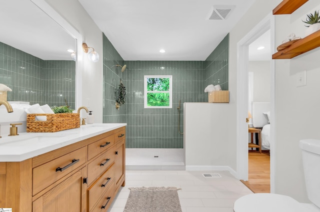 116 Arnold Dr, Anderson, SC 29621 - ensuite bathroom with double vanity, toilet, a walk in shower, and recessed lighting