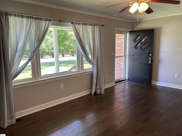 325 Byrnes St, Joanna, SC 29351 - foyer featuring dark wood-style floors, crown molding, baseboards, and a ceiling fan