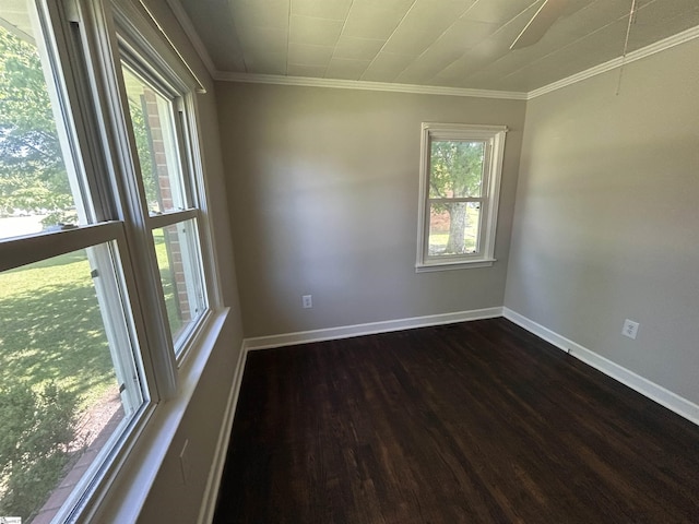 325 Byrnes St, Joanna, SC 29351 - empty room featuring dark wood-style floors, crown molding, and baseboards