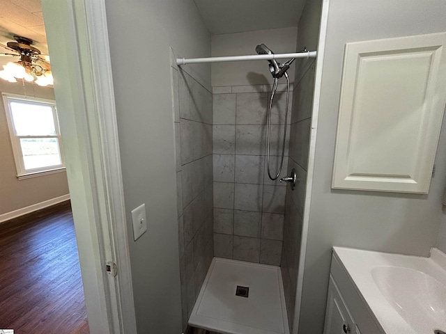 325 Byrnes St, Joanna, SC 29351 - full bathroom featuring vanity, a ceiling fan, a shower stall, and wood finished floors