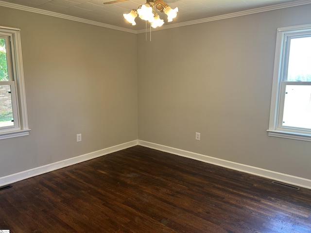 325 Byrnes St, Joanna, SC 29351 - spare room featuring dark wood-style flooring, baseboards, ornamental molding, and ceiling fan