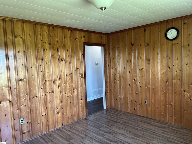 325 Byrnes St, Joanna, SC 29351 - empty room with wood walls and wood finished floors