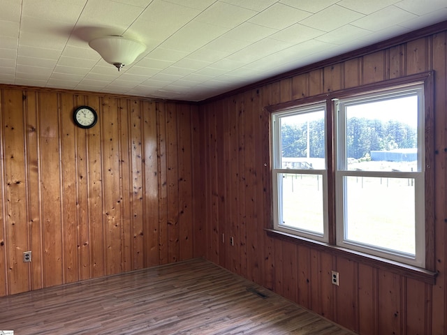 325 Byrnes St, Joanna, SC 29351 - unfurnished room featuring wood walls and wood finished floors
