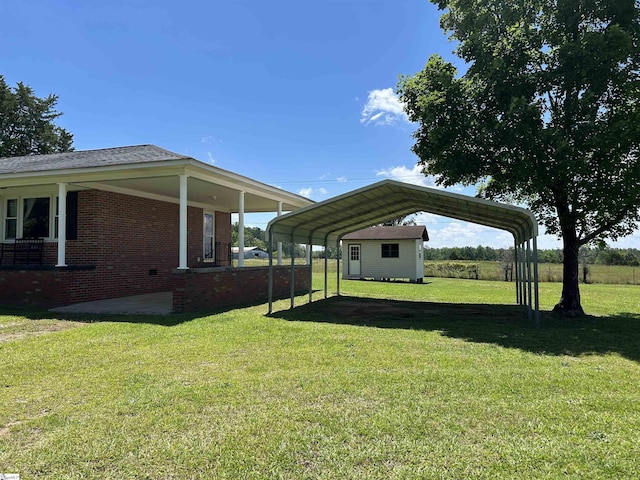 325 Byrnes St, Joanna, SC 29351 - view of grassy yard with a carport