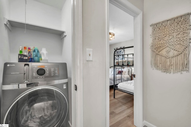 250 Elm St # 507, Clemson, SC 29631 - laundry area with washer / dryer, wood finished floors, and attic access