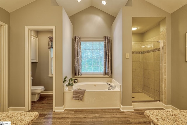 201 Woodridge Dr, Spartanburg, SC 29301 - bathroom with a bath, wood finished floors, a stall shower, toilet, and lofted ceiling