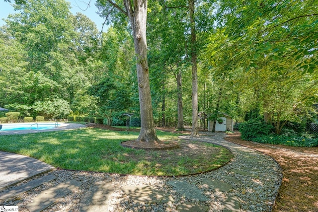 201 Woodridge Dr, Spartanburg, SC 29301 - view of grassy yard with an outdoor pool and a patio