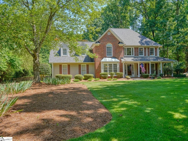201 Woodridge Dr, Spartanburg, SC 29301 - view of front of house featuring a front lawn, covered porch, and roof with shingles