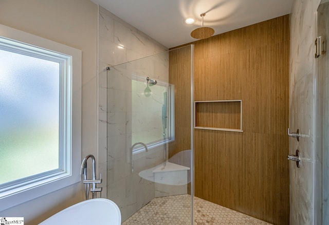 11 Stall St, Greenville, SC 29609 - bathroom with a shower stall and tile patterned floors