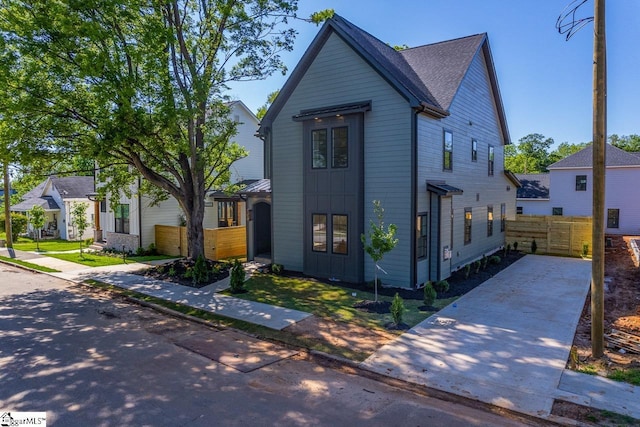 11 Stall St, Greenville, SC 29609 - view of front facade featuring board and batten siding