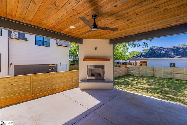 11 Stall St, Greenville, SC 29609 - view of patio / terrace featuring exterior fireplace and ceiling fan