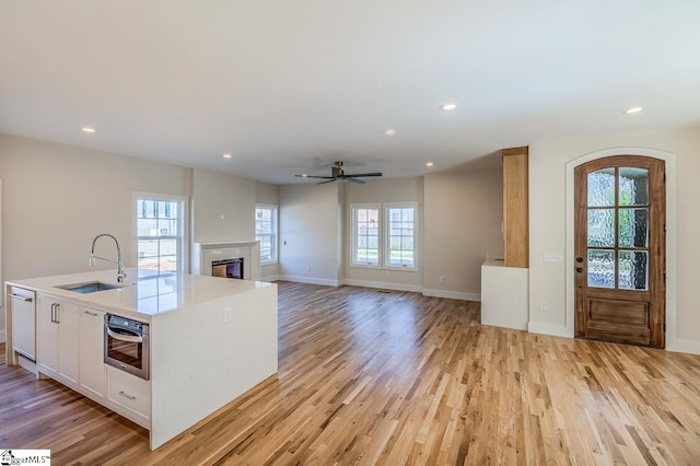 11 Stall St, Greenville, SC 29609 - kitchen with a sink, dishwashing machine, healthy amount of natural light, light wood-type flooring, and recessed lighting