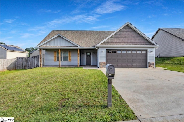 624 Renita Dr, Boiling Springs, SC 29316 - view of front of house with an attached garage, concrete driveway, stone siding, a porch, and roof with shingles