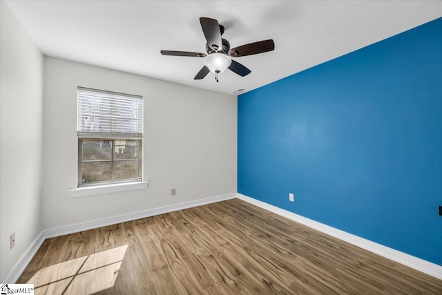 624 Renita Dr, Boiling Springs, SC 29316 - spare room with wood finished floors, baseboards, and a ceiling fan