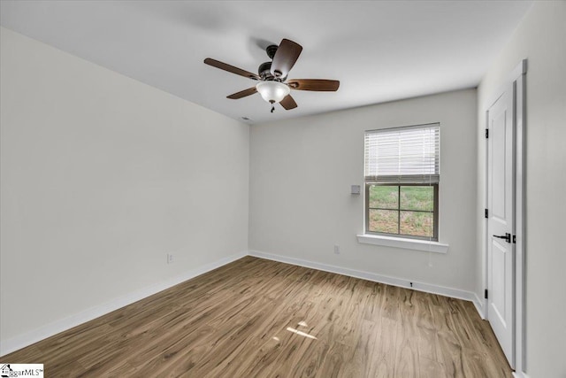 624 Renita Dr, Boiling Springs, SC 29316 - spare room featuring wood finished floors, baseboards, and ceiling fan