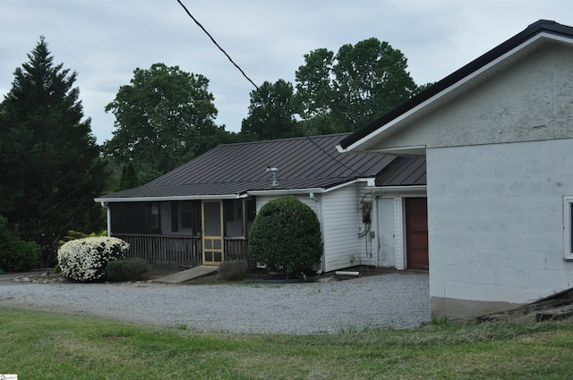 105 S Oakleaf Dr, Landrum, SC 29356 - view of front of home featuring a standing seam roof, covered porch, metal roof, and an attached garage