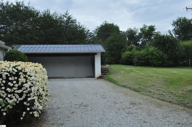 105 S Oakleaf Dr, Landrum, SC 29356 - garage featuring gravel driveway