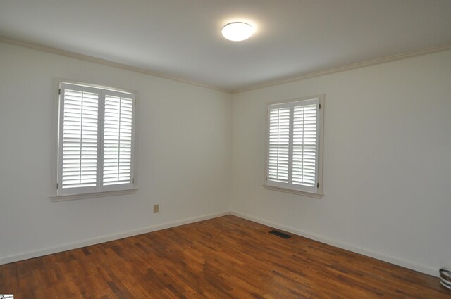 105 S Oakleaf Dr, Landrum, SC 29356 - unfurnished room with crown molding, wood finished floors, and baseboards