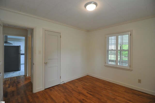 105 S Oakleaf Dr, Landrum, SC 29356 - empty room featuring ornamental molding, dark wood-style flooring, and baseboards