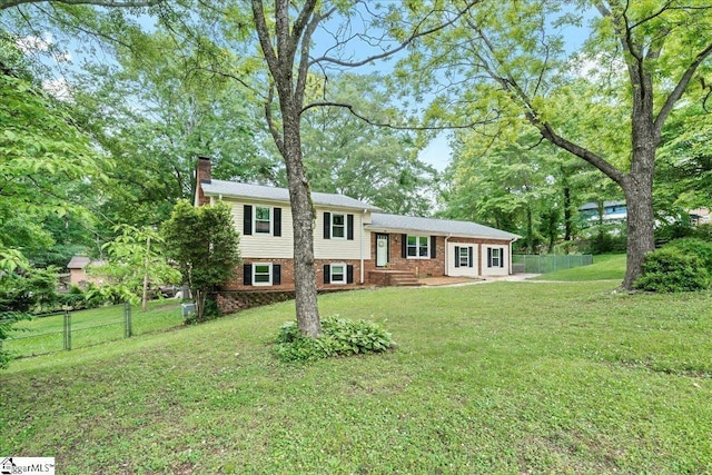 116 Kennedy St, Easley, SC 29642 - split level home featuring a chimney and brick siding