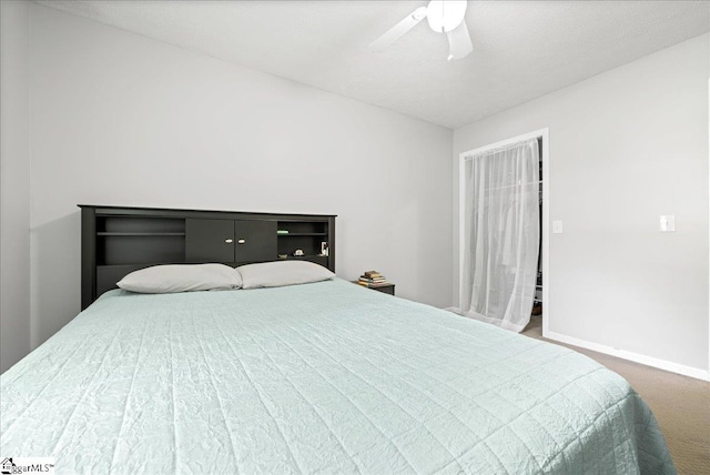 116 Kennedy St, Easley, SC 29642 - bedroom featuring baseboards, ceiling fan, and carpet