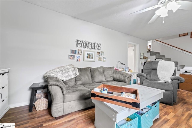 116 Kennedy St, Easley, SC 29642 - living room with stairway, wood finished floors, a ceiling fan, and baseboards