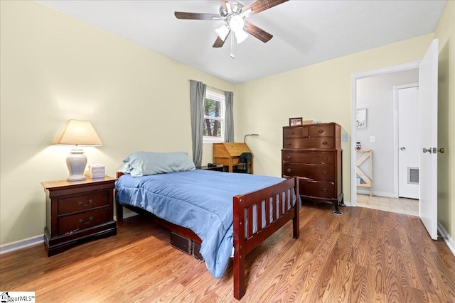 116 Kennedy St, Easley, SC 29642 - bedroom with wood finished floors, baseboards, and ceiling fan