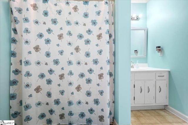 116 Kennedy St, Easley, SC 29642 - full bathroom with vanity, a shower with shower curtain, and baseboards