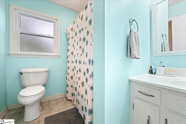 116 Kennedy St, Easley, SC 29642 - bathroom with vanity, toilet, baseboards, and curtained shower